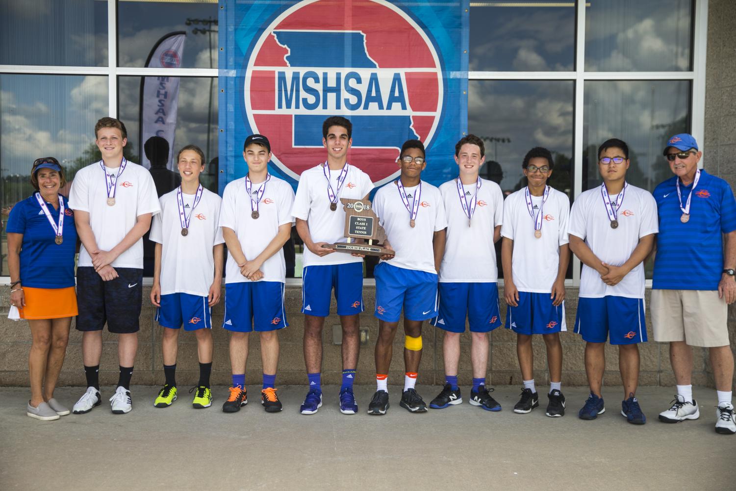 Coach Suzie Luten, far left, and the 2018 CHS Boys Tennis Team took home 4th place in the annual MSHSAA State Championships at Cooper Tennis Complex in Springfield, MO.
