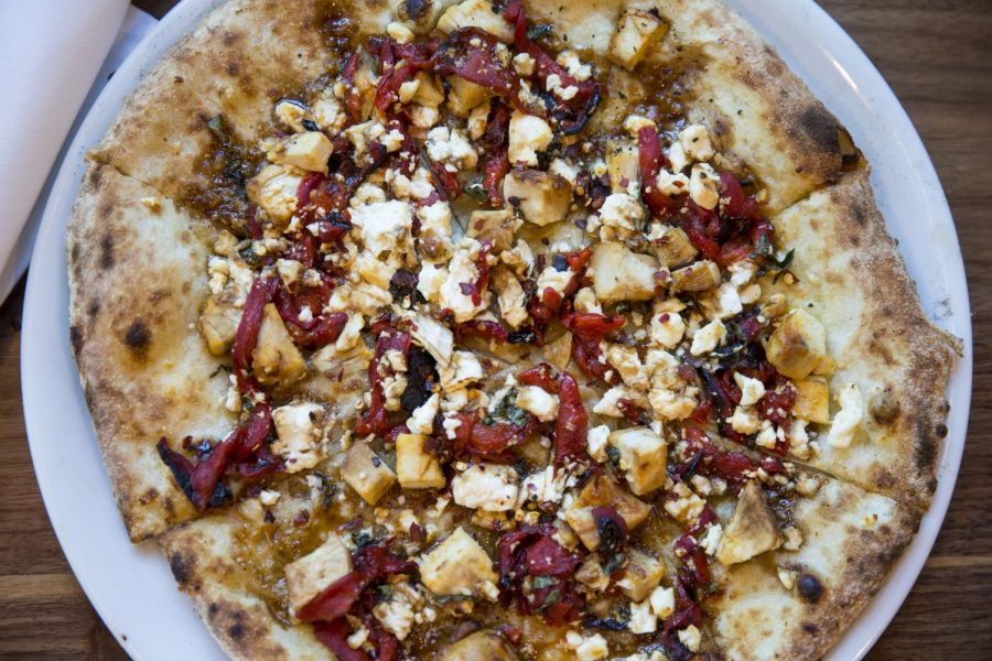Peels Buffalo wood-fired pizza consists of chicken, BBQ sauce, and more.