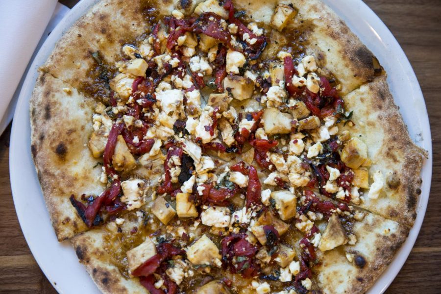 Peel's "Buffalo" wood-fired pizza consists of chicken, BBQ sauce, and more.