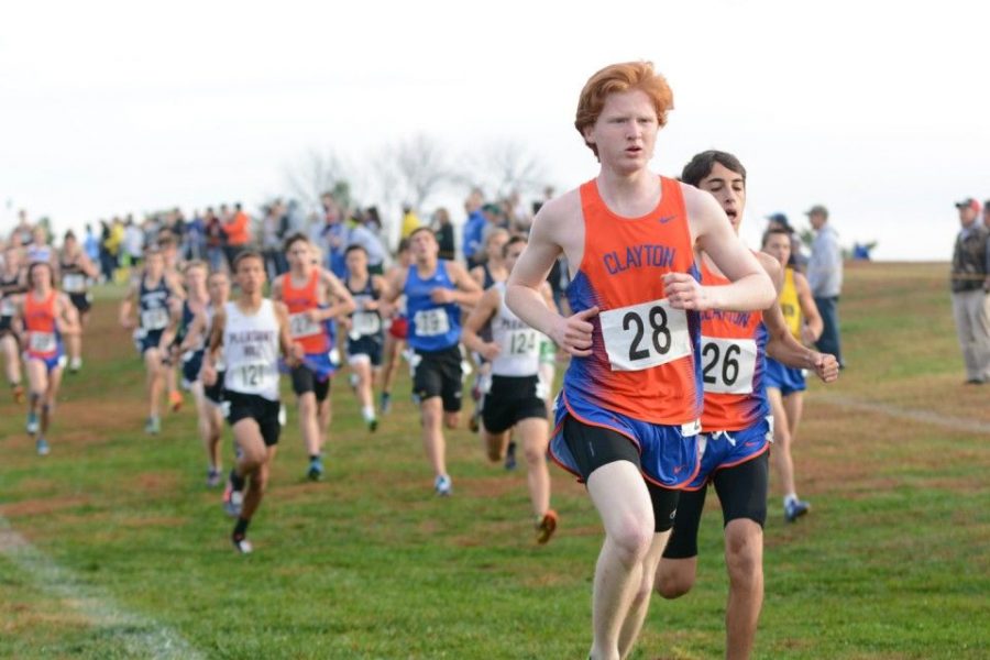 Isaiah Hayward (28) competes at the 2016 MSHSAA XC State Championships in Jefferson City. Behind Hayward is fellow CHS runner and senior Justin Guilak (26), as well as Class of 2017 graduates Lucas Hoffman and Krai Gund.