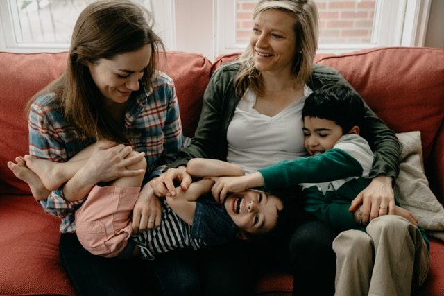 Photo of CHS Journalism Teacher Erin Sucher-O’Grady (Center) and her wife, 
Dr. Lauren Sucher-O’Grady, (Left) and children, Paul Castellano (Center) 
and Tommy Castellano (Right).