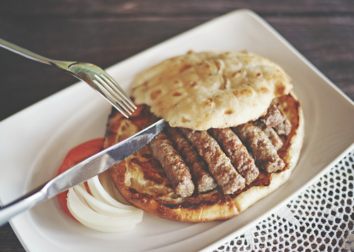Grbićs ćevapi. A Balkan staple, these small beef sausages come sandwiched between slices of lepinja, a pita-like flatbread.