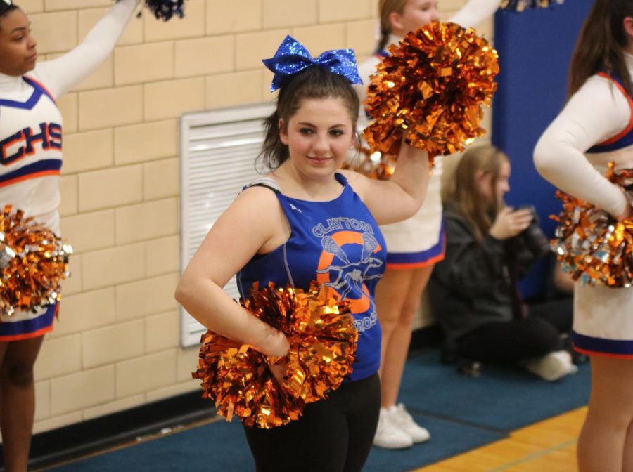 Freshman Christa Resinger dances at a boys' varsity basketball game on January 15, 2019.