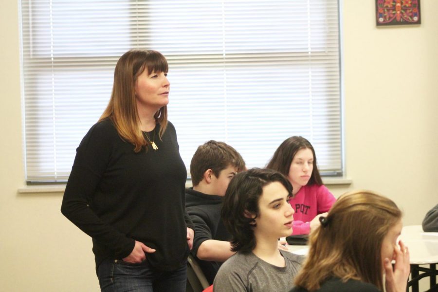 CHS history teacher Brooke Hartmann allows fellow history teacher Josh Meyers to present to their co-taught World/US History I class.