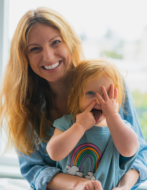 Kate Berland, Class of 1999, with her two year old daughter.