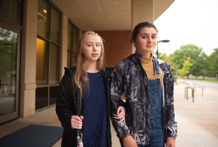 Holly Connor (left) stands with Sara Parietti (right) outside of Wydown Middle School.