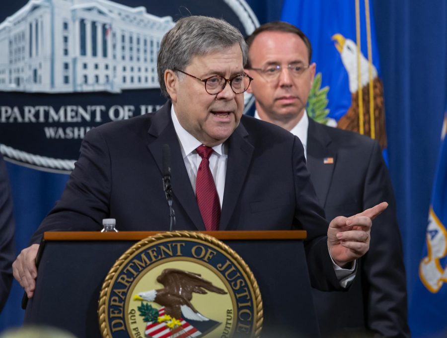 U.S. Attorney General William Barr, left, and Deputy Attorney General Rod Rosenstein hold a press conference at the US Department of Justice on April 18, 2019 in Washington, D.C. The briefing comes just before the release of a redacted version of Special Counsel Robert Muellers report on Russian interference in the 2016 election.