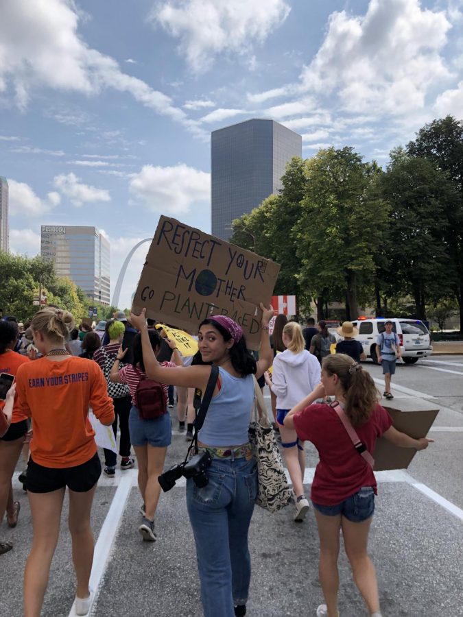 CHS juniors Sofia Erlin, Ella Ferguson and Belle Gage at the St. Louis climate march on Friday, September 20. The march took place on Market Street in downtown St. Louis.