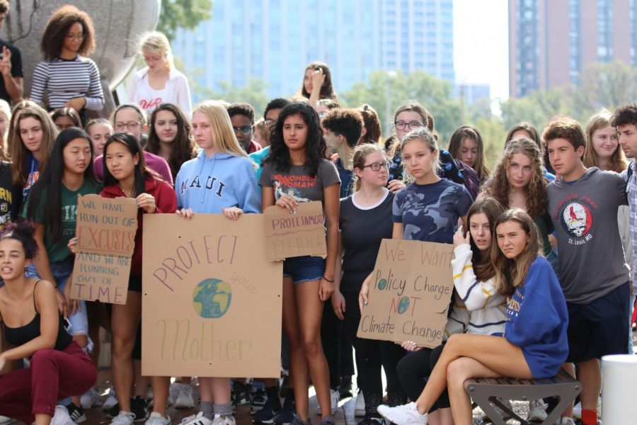 CHS climate activists gathered for the strike in front of the globe statue