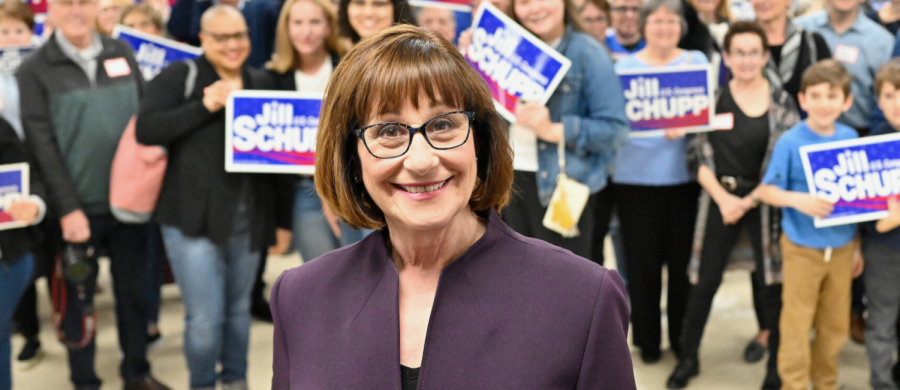Jill Schupp surrounded by a group of her supporters