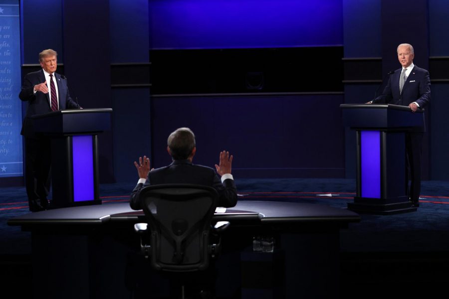 President Donald Trump, left, and Democratic presidential nominee Joe Biden, right, participate in the first presidential debate, moderated by Fox News anchor Chris Wallace at the Health Education Campus of Case Western Reserve University, on Tuesday, Sept. 29, 2020, in Cleveland. 