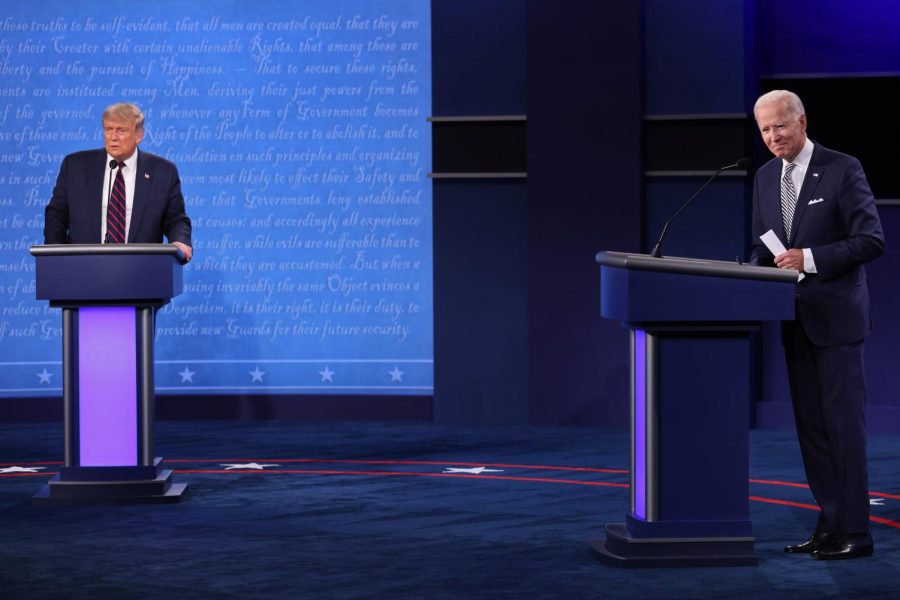 n this file photo, U.S. President Donald Trump and Democratic presidential nominee Joe Biden look out to the audience at end of the first presidential debate at the Health Education Campus of Case Western Reserve University on September 29, 2020 in Cleveland, OH.
