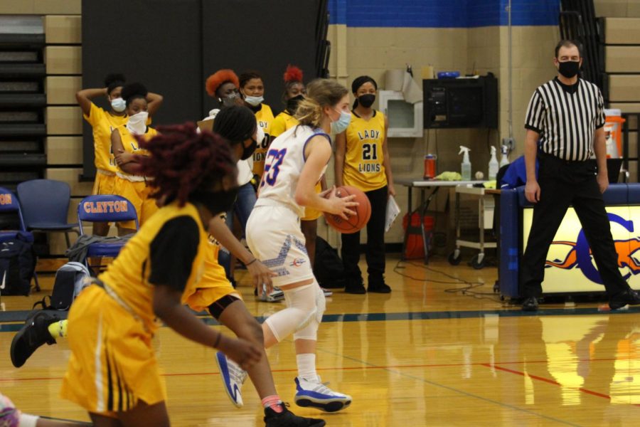 Clayton High School's Girl's Basketball team. All players are required to wear masks due to coronavirus.