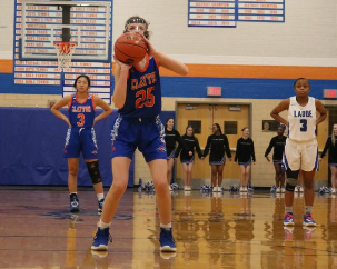 Senior Anna Upshaw takes a free throw against Ladue in the Coaches vs Cancer game last season (2019-2020)