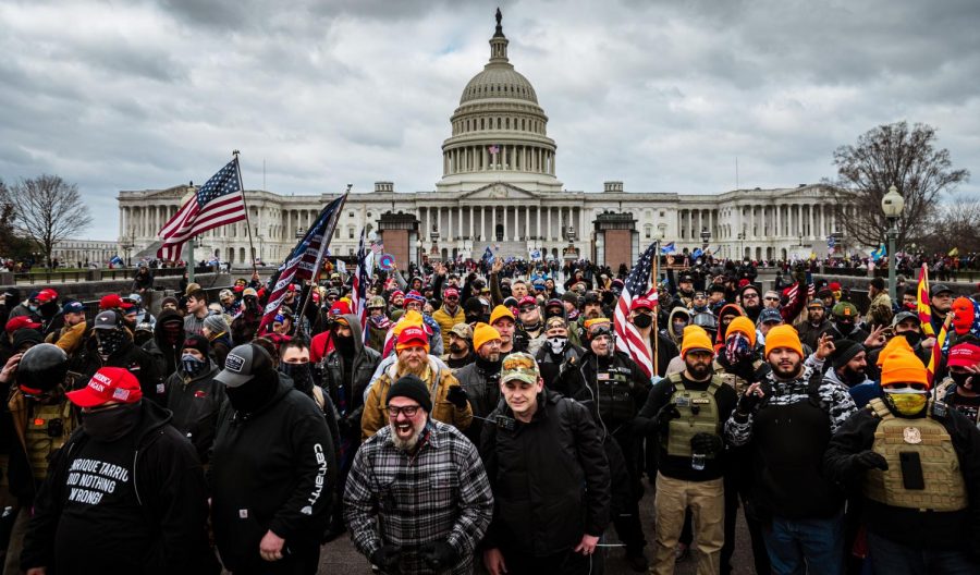 Pro-Trump protesters gather in front of the U.S. Capitol Building on January 6, 2021 in Washington, DC. A pro-Trump mob stormed the Capitol, breaking windows and clashing with police officers. Trump supporters gathered in the nation's capital today to protest the ratification of President-elect Joe Biden's Electoral College victory over President Trump in the 2020 election.