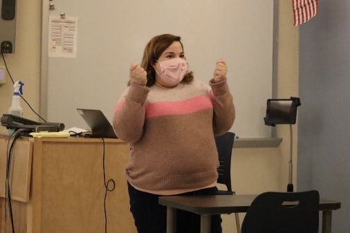 Ms. Cooper teaching one of her two College-Prep English classes for sophomores in room 004. She comes to school everyday and entertains her students when doing her part.