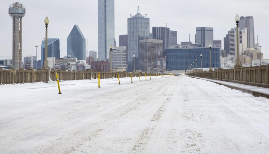 A snow-covered downtown Dallas, Texas seen from South Houston Street on Monday, February 15, 2021. 