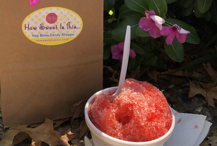 A cherry shaved ice and bag of candy purchased from the How Sweet is This candy shop in DeMun Park.