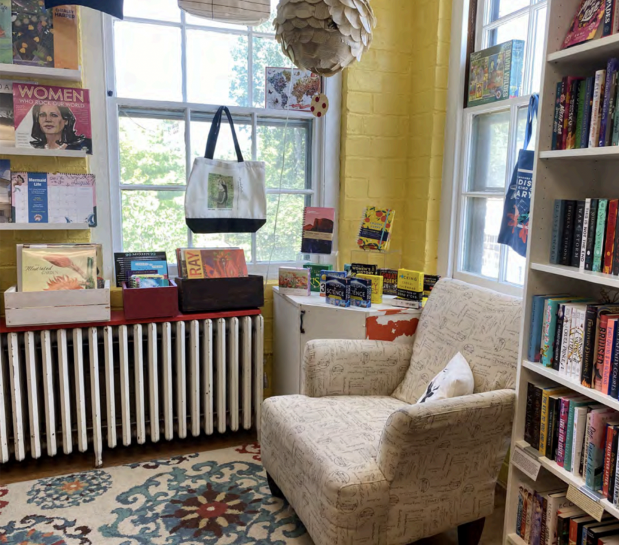 A comfortable seating area in the back of The Novel Neighbor.