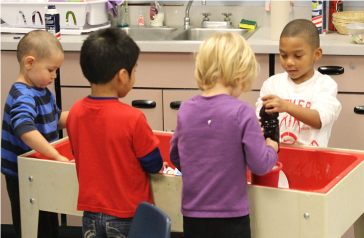 Children play in a preschool before COVID-19