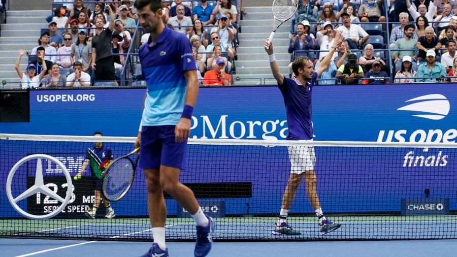 Medvedev celebrates after winning a crucial point during the match