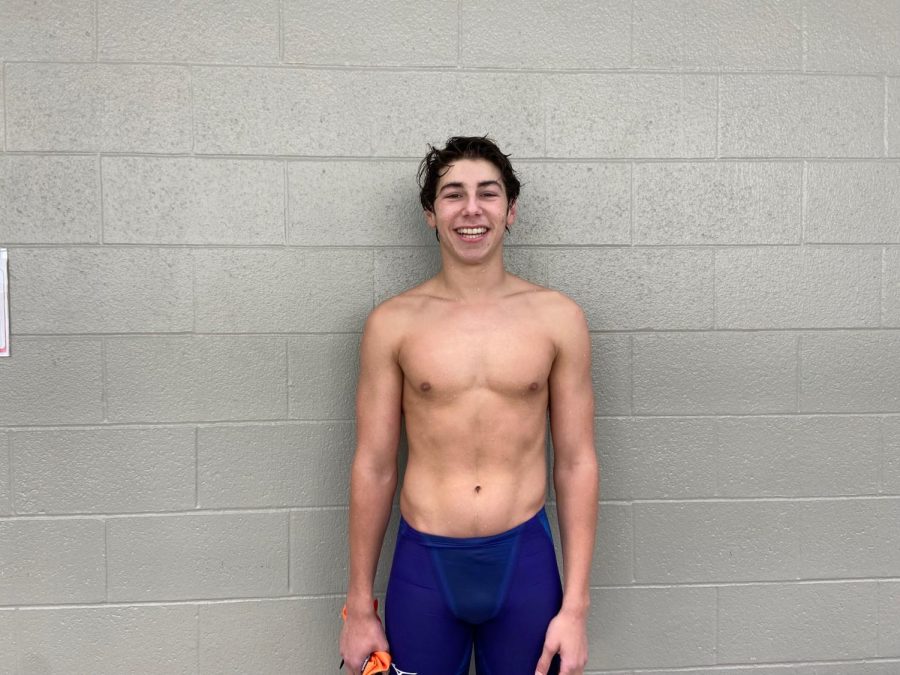 Graham Zucker smiles after a long meet breaking two school records. 