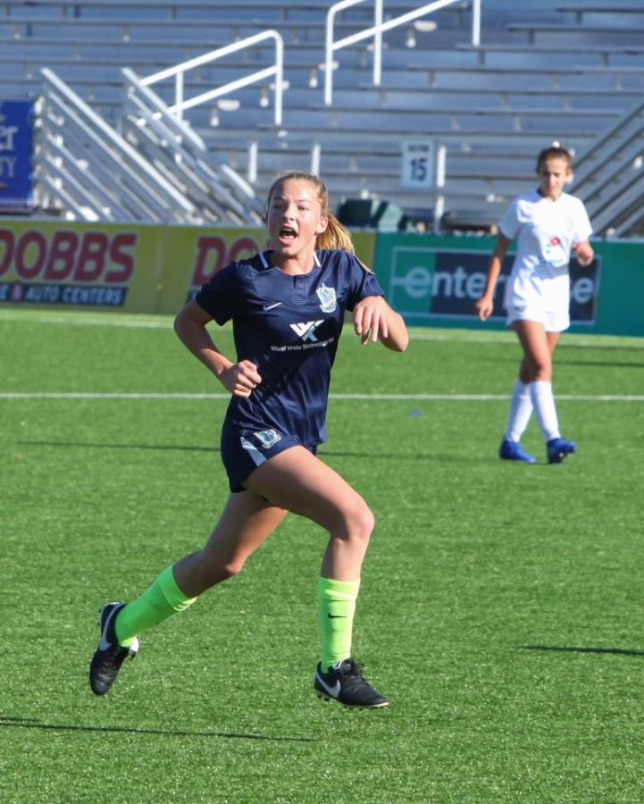 Junior Erin Connolly yells to a teammate during a game for her club soccer team St. Louis Scott Gallagher. 