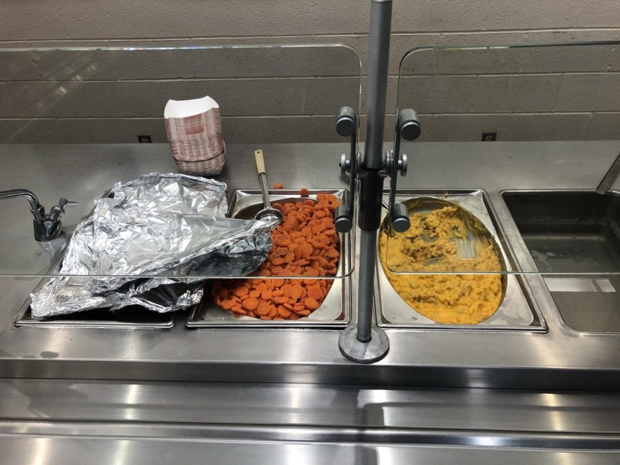 The main course of the menu: macaroni and cheese with a side of steamed carrots. The steamed carrots were obviously from cans. 