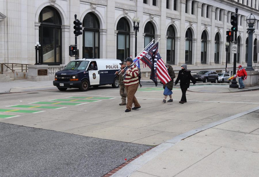 Trump supporters walk the streets of Washington DC on the morning of January 6th, 2021