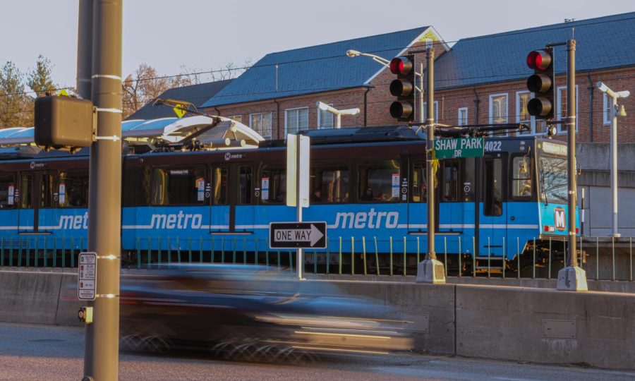 A train departs the Clayton MetroLink station.