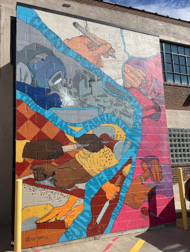 Mural outside of MADE Makerspace by Sophie Binder. 