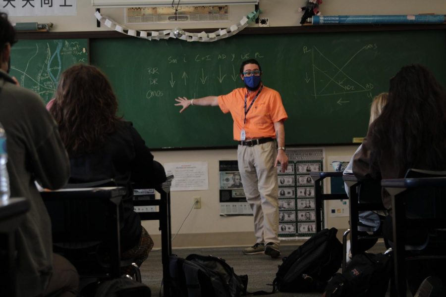 CHS Social Studies Teacher Daniel Glossenger instructs his AP Economics class. 