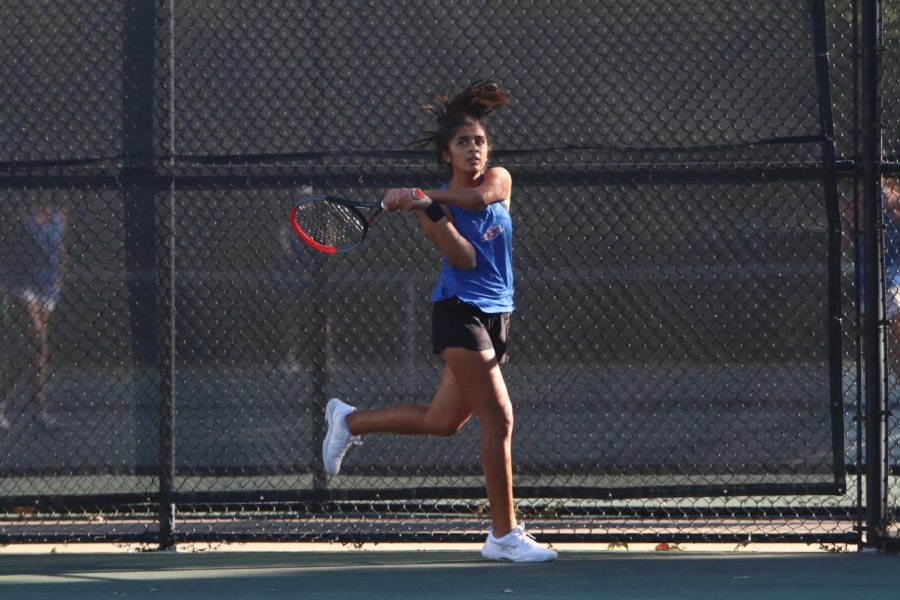 Aanya playing tennis 