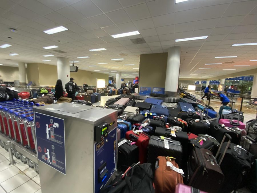 St. Louis Lambert International Airport baggage claim after pipe bursts, flooding passengers luggage