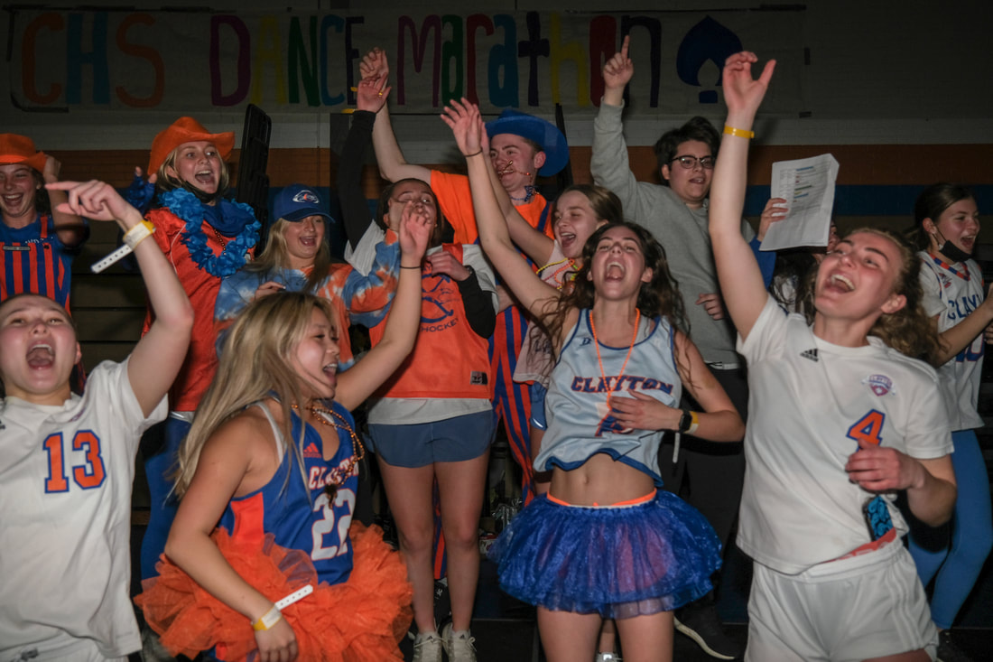 Students dancing at the Dance Marathon Event in 2022 before the unveiling of the proceeds.