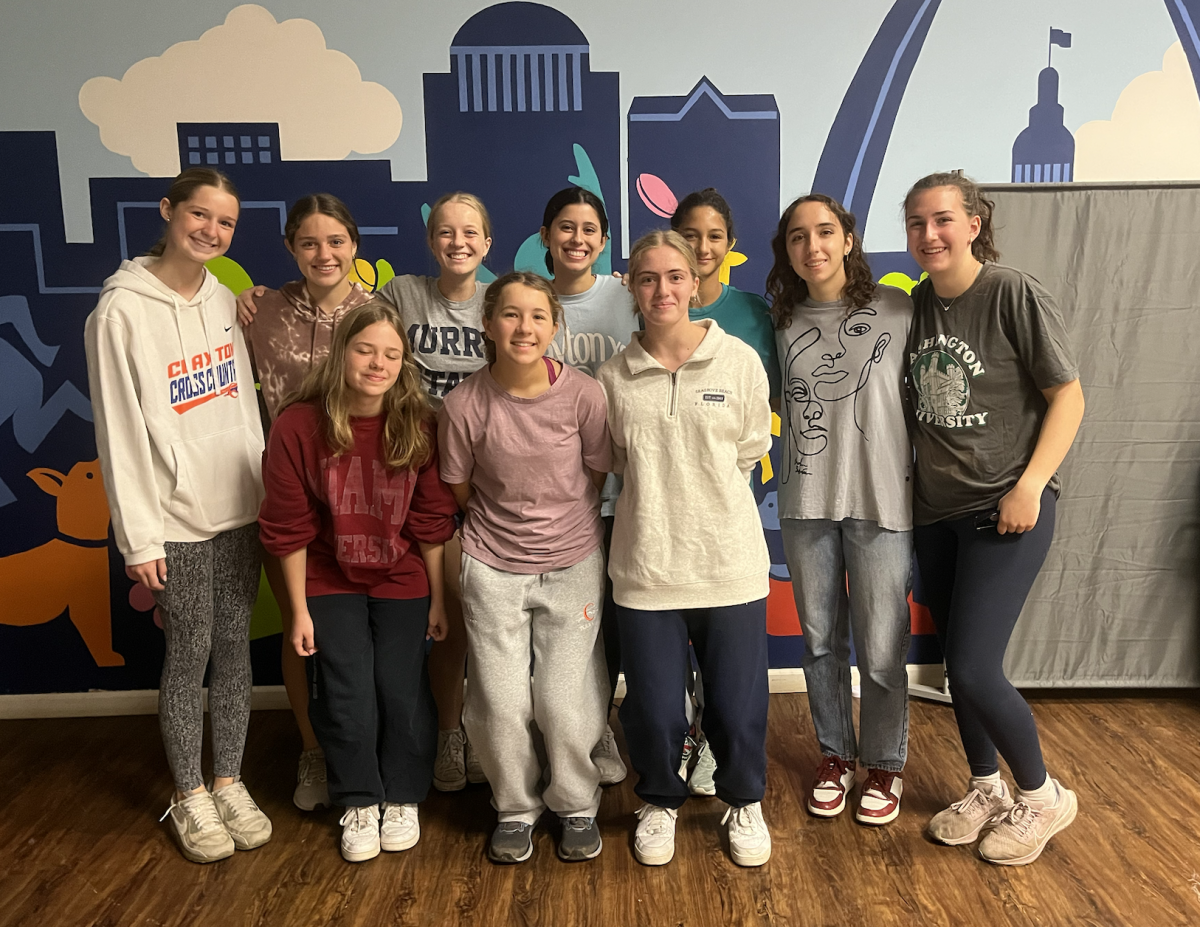 Cross Country Girls at Dog Shelter