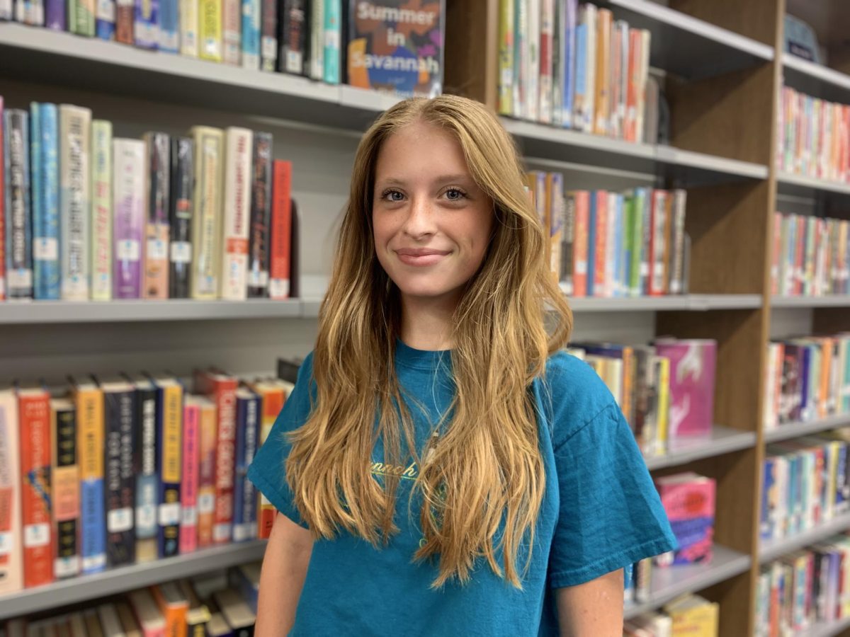 Charlie Meyers smiles in the CHS library.