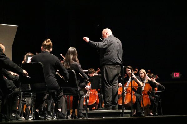 Orchestra Director Daniel Henderson leads a Symphonic Orchestra performance. Clayton performers have won numerous awards and convention trips as ensembles and individually. 
