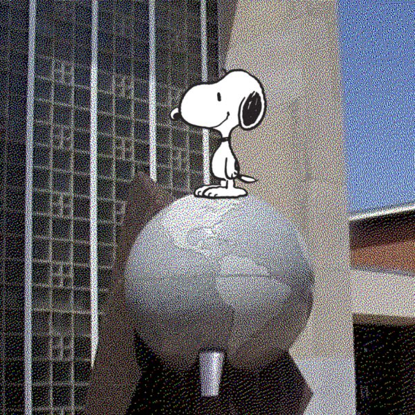 A Snoopy illustration stands on the globe statue at CHS' entrance.
