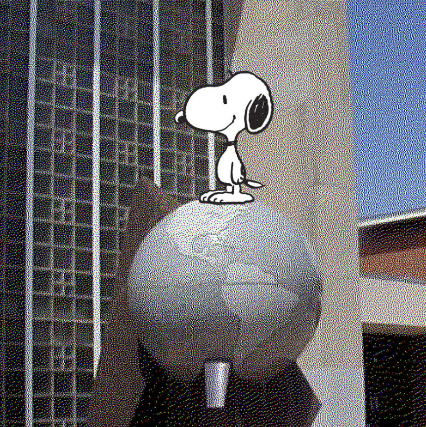 A Snoopy illustration stands on the globe statue at CHS' entrance.
