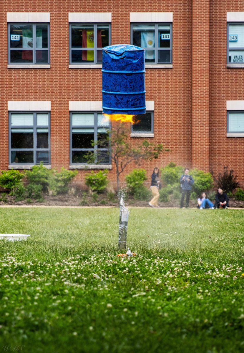 For the seniors last class, AP Chemistry teacher Nathan Peck blows up a barrel in the quad. This annual event is a class tradition.