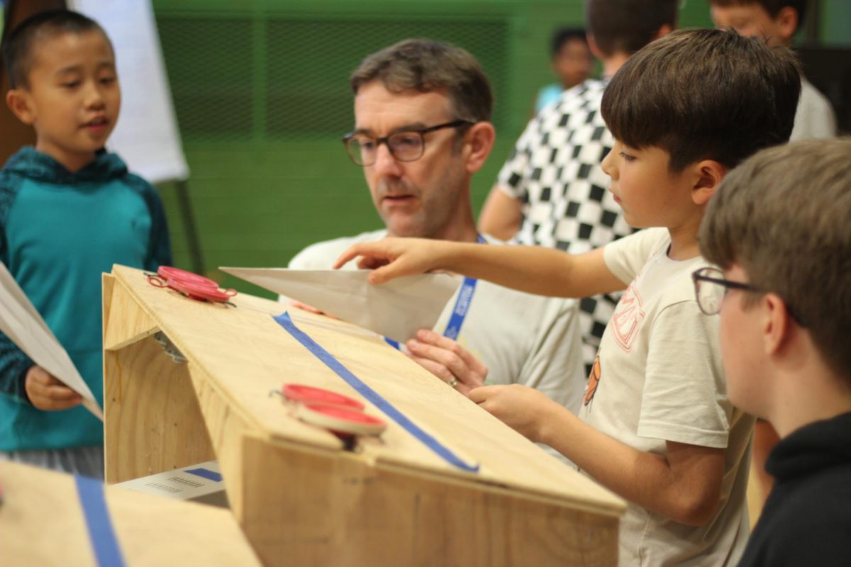 Glenridge Elementary School hosts a night where students interact and create using science, technology, engineering, the arts and mathematics. The Clayton robotics team the Robohounds, helped with the stations, one of which included their previous season’s robot.