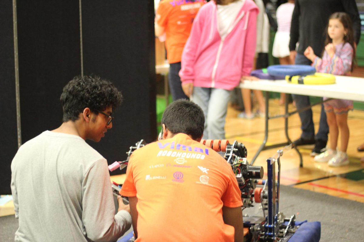 To give the elementary students the full driving experience, the team pauses the station. Buckley and Poovathumkadavil got together and fixed the robot through fluid teamwork, which brought the Robohounds together. “People should join robotics because it's an inclusive environment. There's something for everyone. There are a bunch of different sub-teams, and you can find what's best for you within this really large group,” Poovathumkadavil said.