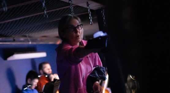 Retired band director Jennifer Shenberger returned from retirement to conduct the pit orchestra for the production of Les Misérables.