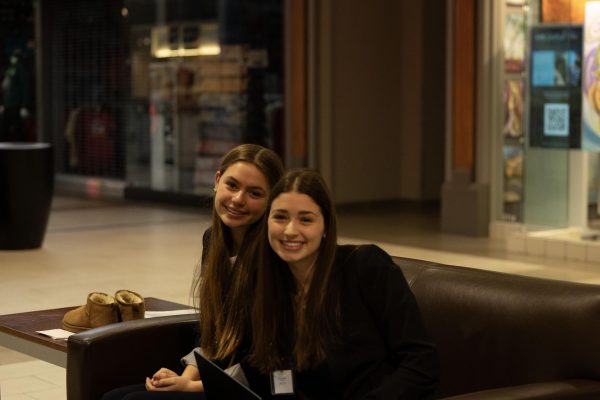 Sophomores Giselle Hausladen and Ema Stojicevic smile big after competing in their event. 