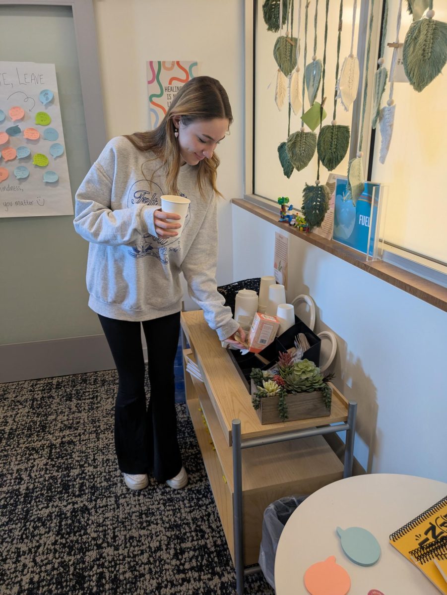 9:00 a.m.
Sophomore Kyra Welton brews tea at the Wellness Center. The Wellness Center provided tea, coloring books, board games, mindfulness videos, kinetic sand, and a zen garden. “It's nice to have the Wellness Center available as a resource and a place to go during the school day. My friends and I like to go get tea because it's fun and a nice refreshment,” Welton said.
