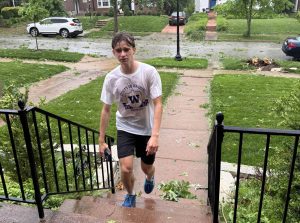 After struggling to enter his neighbor's home for safety, junior Karl Barthel returns home after his run.