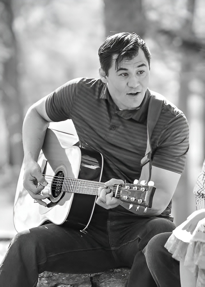 Director of Student Support Michael Siebe plays the guitar with his church. His favorite song to play is, "どんな時でも."