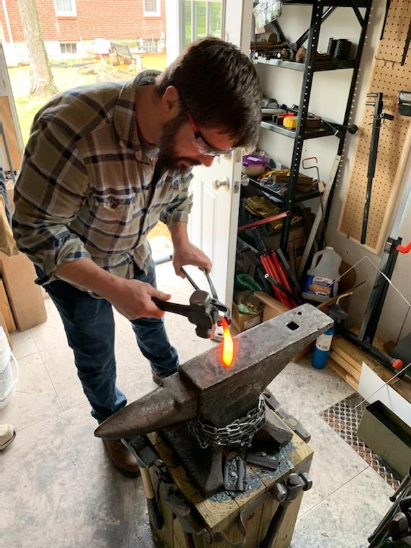 CTE teacher Jason Zenser practices his metalworking hobby. “I’ve always loved creating things and building things with my hands. Engineering is the application of science,” Zenser said.