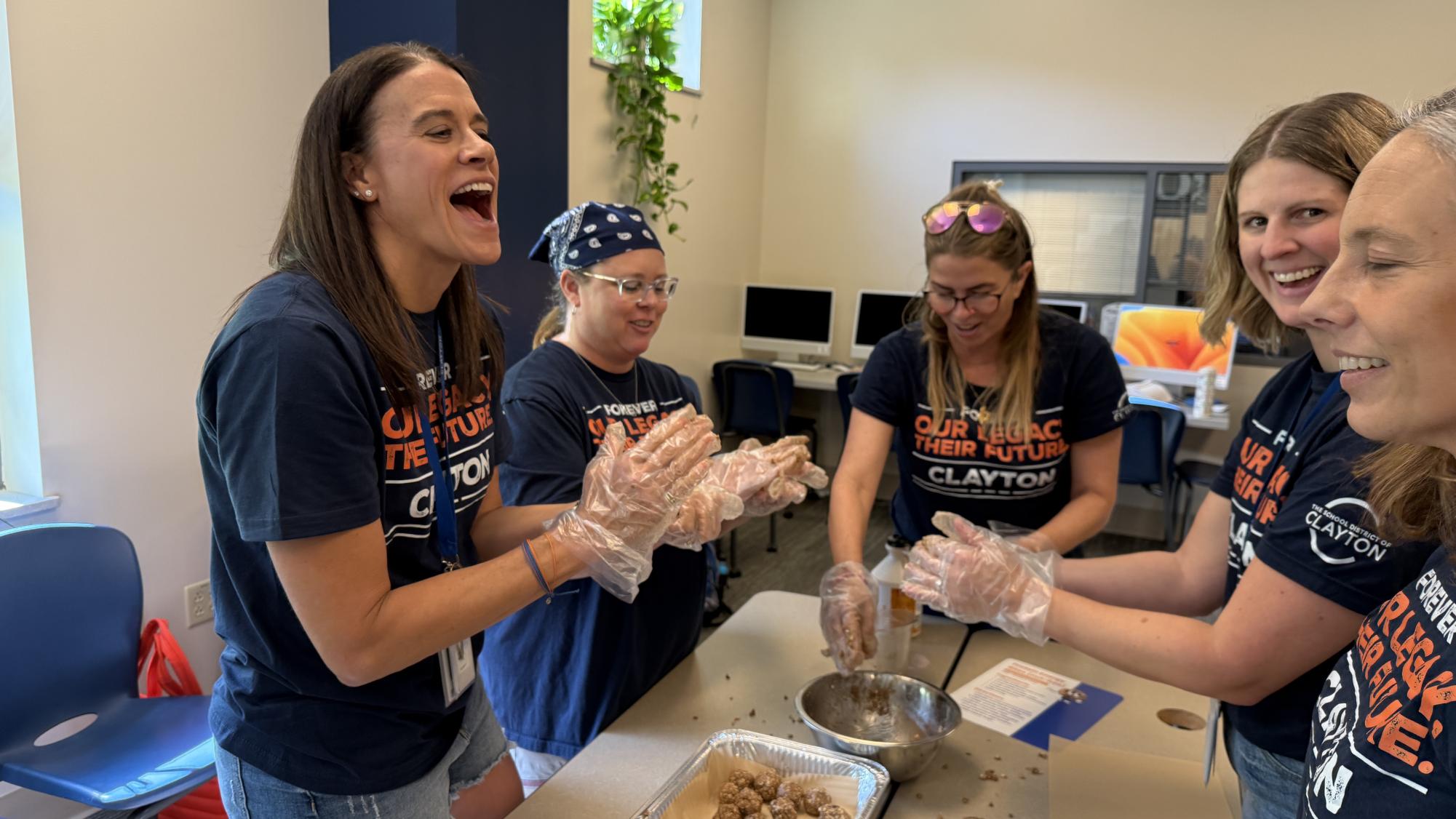 Middle school teachers make protein balls for Evelyn’s House, a hospice care center. Health teacher Jill Warner enjoyed connecting with her colleagues while providing for terminally ill patients. “It was the best part of our morning. This makes us all better colleagues & more likely to work as a stronger team moving forward,” Warner said.